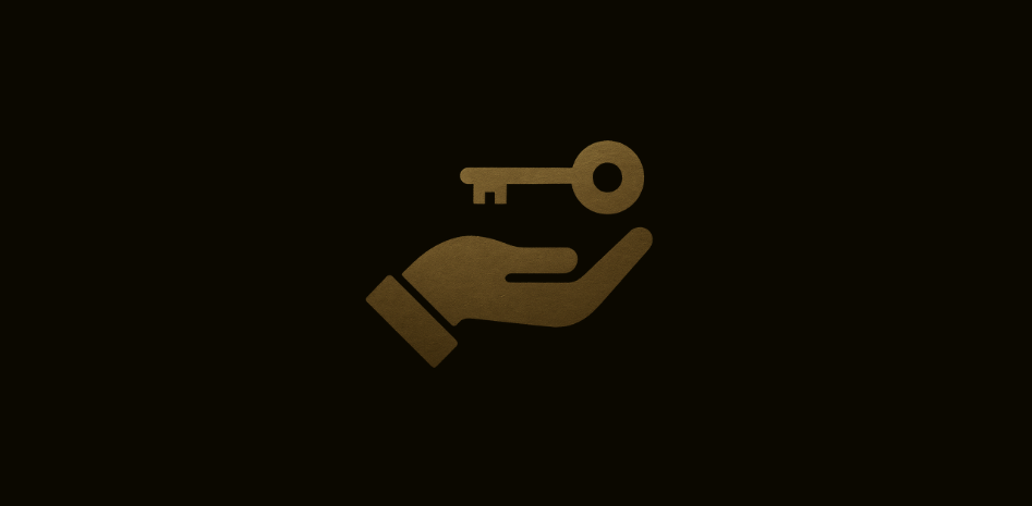 Ícone minimalista em dourado mostrando uma mão segurando uma chave, simbolizando planejamento e acesso, associado à decisão de fazer um consórcio.